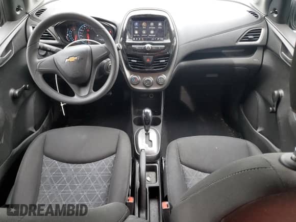 2020 Chevrolet Spark LS с VIN KL8CB6SA2LC458215, выставлен на аукционе Copart как лот 84365085 с пробегом 44 239 миль миль и Списание • Salvage title. История ставок и продаж доступна на DreamBid. Изображение 8.
