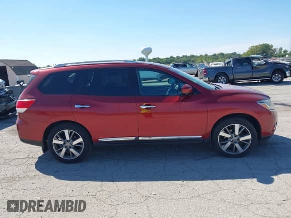 2015 Nissan Pathfinder Platinum with VIN 5N1AR2MM7FC704573, listed as a IAAI auction lot 43247042 with 100,433 mi miles and . Bid and sale history available at DreamBid. Image 13.