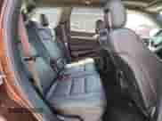 2014 Jeep Grand Cherokee Summit с VIN 1C4RJEJG3EC248651, выставлен на аукционе Copart как лот 63595295 с пробегом 125 973 миль миль и Списание • Salvage title. История ставок и продаж доступна на DreamBid. Изображение 11.