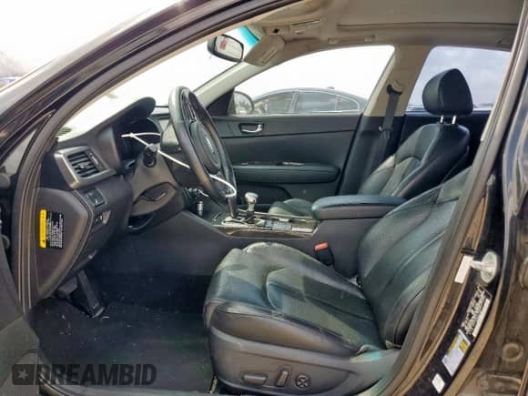 2016 Kia Optima EX z VIN 5XXGU4L33GG011650, wystawiony jako Copart lot #70344885 z przebiegiem 138 076 mil mil oraz Szkoda całkowita • Salvage title. Historia ofert i sprzedaży dostępna na DreamBid. Obrazek 7.