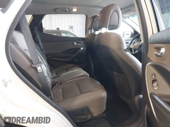 2014 Hyundai Santa Fe z VIN 5XYZUDLB4EG183114, wystawiony jako IAAI lot #43048075 z przebiegiem 121 851 mil mil oraz . Historia ofert i sprzedaży dostępna na DreamBid. Obrazek 8.