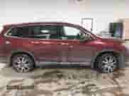 2021 Honda Pilot Touring 7-Passenger z VIN 5FNYF6H61MB044707, wystawiony jako IAAI lot #41548250 z przebiegiem 77 147 mil mil oraz . Historia ofert i sprzedaży dostępna na DreamBid. Obrazek 13.