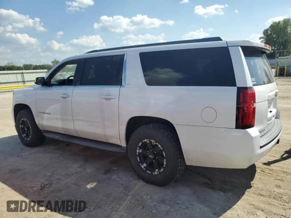 2015 Chevrolet Suburban LT с VIN 1GNSKJKC8FR157657, выставлен на аукционе Copart как лот 81807565 с пробегом 219 226 миль миль и Списание • Salvage title. История ставок и продаж доступна на DreamBid. Изображение 2.