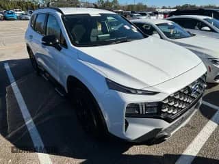 2022 Hyundai Santa Fe XRT with VIN 5NMS64AJ3NH401023, listed as a Copart auction lot 43524724 with 26,726 mi miles and . Bid and sale history available at DreamBid. Image 1.
