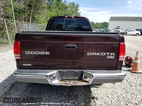 2004 Dodge Dakota SLT z VIN 1D7HG42N14S749128, wystawiony jako Copart lot #60733654 z przebiegiem 101 249 mil mil oraz Szkoda całkowita • Salvage title. Historia ofert i sprzedaży dostępna na DreamBid. Obrazek 6.