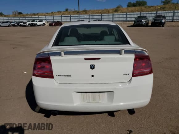 2006 Dodge Charger z VIN 2B3KA43G46H324046, wystawiony jako Copart lot #75922634 z przebiegiem 192 337 mil mil oraz Czysty tytuł • Clean title. Historia ofert i sprzedaży dostępna na DreamBid. Obrazek 6.