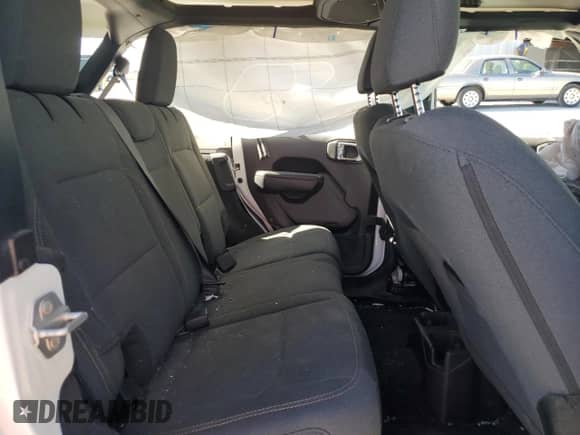 2024 Jeep Wrangler Sport S with VIN 1C4PJXDN7RW243762, listed as a Copart auction lot 77188874 with 18,935 mi miles and Salvage title. Bid and sale history available at DreamBid. Image 11.