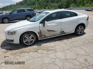 2015 Volvo S60 T5 Premier с VIN YV1612TK0F1344392, выставлен на аукционе Copart как лот 63926495 с пробегом 73 514 миль миль и Списание • Salvage title. История ставок и продаж доступна на DreamBid. Изображение 1.