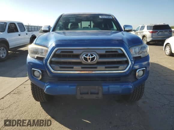 2016 Toyota Tacoma Limited с VIN 3TMGZ5AN9GM018015, выставлен на аукционе Copart как лот 82370585 с пробегом 185 654 миль миль и Списание • Salvage title. История ставок и продаж доступна на DreamBid. Изображение 5.