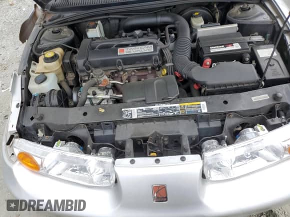 2002 Saturn SL с VIN 1G8ZK52702Z264191, выставлен на аукционе Copart как лот 70042825 с пробегом 118 826 миль миль и Списание • Salvage title. История ставок и продаж доступна на DreamBid. Изображение 11.