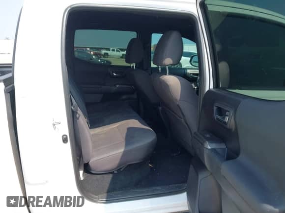 2019 Toyota Tacoma SR5 с VIN 3TMAZ5CN9KM100080, выставлен на аукционе IAAI как лот 43053191 с пробегом 98 434 миль миль и . История ставок и продаж доступна на DreamBid. Изображение 8.