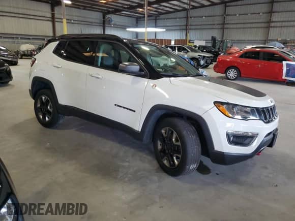 2018 Jeep Compass Trailhawk with VIN 3C4NJDDB0JT457160, listed as a Copart auction lot 67395135 with 93,180 mi miles and Non repairable. Bid and sale history available at DreamBid. Image 4.