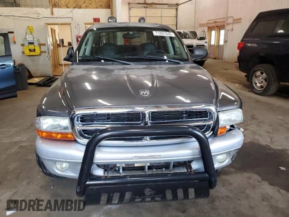 2003 Dodge Dakota SLT с VIN 1D7HG48NX3S100353, выставлен на аукционе Copart как лот 71897645 с пробегом 110 269 миль миль и На запчасти • Non repairable. История ставок и продаж доступна на DreamBid. Изображение 5.