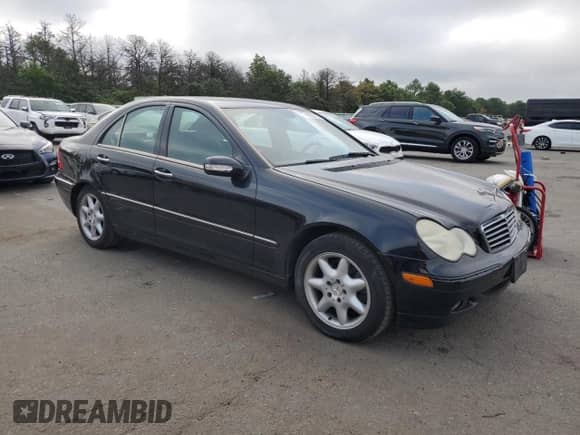 2004 Mercedes-Benz C 240 with VIN WDBRF81J24F554976, listed as a Copart auction lot 68627595 with 58,916 mi miles and Salvage title. Bid and sale history available at DreamBid. Image 4.