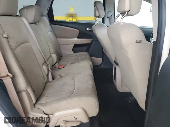 2017 Dodge Journey SE z VIN 3C4PDCAB8HT694844, wystawiony jako Copart lot #85093825 z przebiegiem 118 734 mil mil oraz Szkoda całkowita • Salvage title. Historia ofert i sprzedaży dostępna na DreamBid. Obrazek 11.