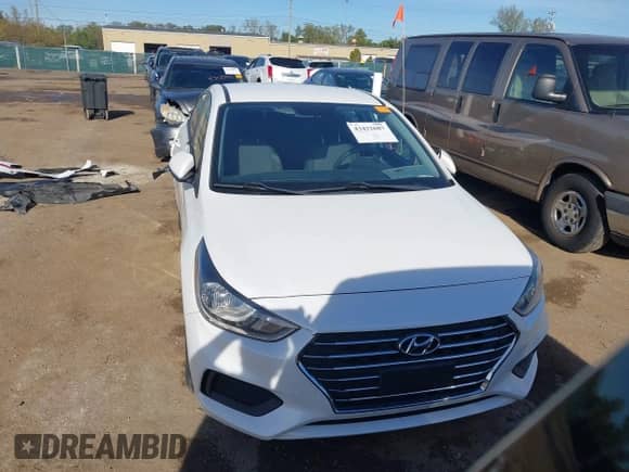 2020 Hyundai Accent SE z VIN 3KPC24A64LE126326, wystawiony jako IAAI lot #43422687 z przebiegiem 54 488 mil mil oraz . Historia ofert i sprzedaży dostępna na DreamBid. Obrazek 13.