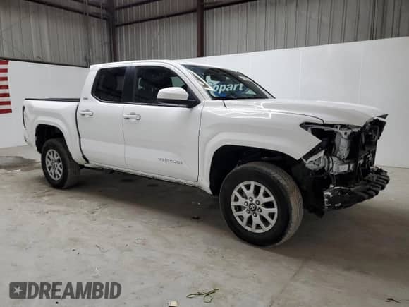 2024 Toyota Tacoma SR5 with VIN 3TMKB5FN2RM011207, listed as a Copart auction lot 80397465 with 28,515 mi miles and Clean title. Bid and sale history available at DreamBid. Image 4.