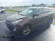 2014 Hyundai Tucson Limited with VIN KM8JU3AGXEU833578, listed as a IAAI auction lot 42646016 with 122,387 mi miles and . Bid and sale history available at DreamBid. Image 2.