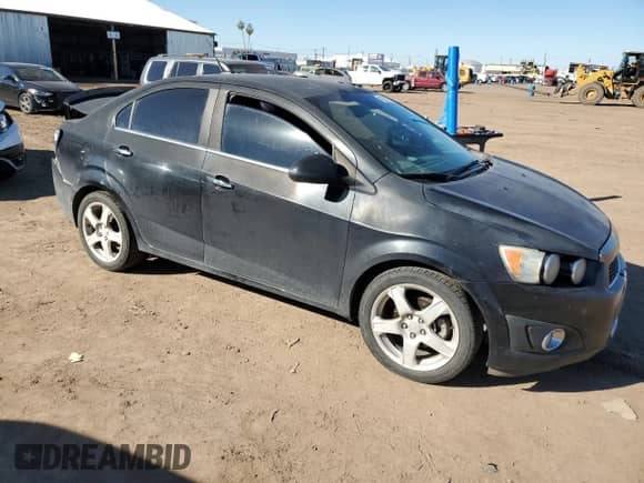 2013 Chevrolet Sonic LTZ с VIN 1G1JE5SH7D4226596, выставлен на аукционе Copart как лот 40272184 с пробегом 150 981 миль миль и Списание • Salvage title. История ставок и продаж доступна на DreamBid. Изображение 4.