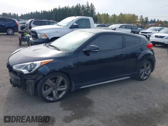 2013 Hyundai Veloster Turbo с VIN KMHTC6AE3DU158036, выставлен на аукционе IAAI как лот 43401490 с пробегом 142 089 миль миль и . История ставок и продаж доступна на DreamBid. Изображение 2.