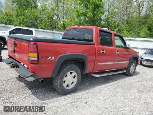 2004 GMC Sierra 1500 SLE with VIN 2GTEK13T641413157, listed as a Copart auction lot 55676575 with 200,884 mi miles and Salvage title. Bid and sale history available at DreamBid. Image 3.
