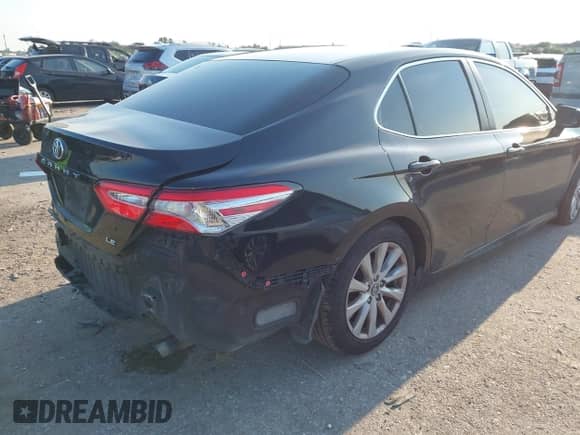 2018 Toyota Camry SE with VIN 4T1B11HK4JU658668, listed as a IAAI auction lot 43204847 with 195,921 mi miles and . Bid and sale history available at DreamBid. Image 4.