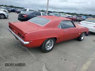 1969 Chevrolet Camaro с VIN 123379N533684, выставлен на аукционе Copart как лот 74764744 с пробегом 91 198 миль миль и Списание • Salvage title. История ставок и продаж доступна на DreamBid. Изображение 3.