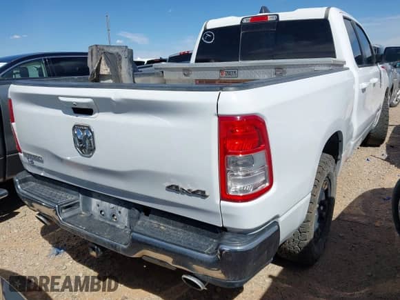 2022 Ram 1500 Big Horn with VIN 1C6SRFBT0NN179909, listed as a IAAI auction lot 42747237 with 91,521 mi miles and . Bid and sale history available at DreamBid. Image 4.