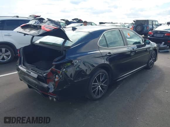 2021 Toyota Camry SE Nightshade z VIN 4T1G11AK8MU494510, wystawiony jako IAAI lot #43225311 z przebiegiem 73 978 mil mil oraz . Historia ofert i sprzedaży dostępna na DreamBid. Obrazek 4.