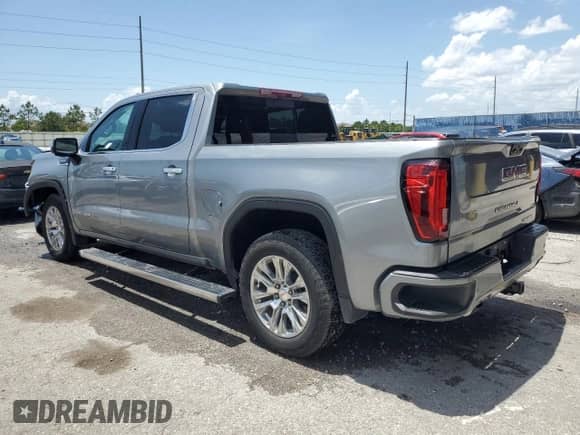 2023 GMC Sierra 1500 Denali z VIN 1GTUUGED7PZ270231, wystawiony jako Copart lot #58398935 z przebiegiem 14 572 mil mil oraz Nie do naprawy • Non repairable. Historia ofert i sprzedaży dostępna na DreamBid. Obrazek 2.
