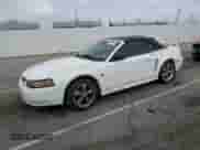 2004 Ford Mustang Deluxe с VIN 1FAFP44454F123067, выставлен на аукционе Copart как лот 86784474 с пробегом 161 541 миль миль и Списание • Salvage title. История ставок и продаж доступна на DreamBid. Изображение 1.