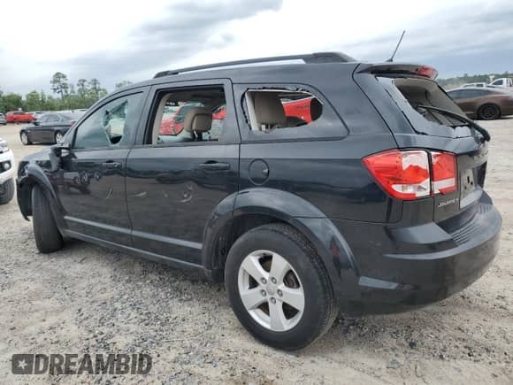 2012 Dodge Journey American Value с VIN 3C4PDCAB1CT169939, выставлен на аукционе Copart как лот 65083445 с пробегом 180 035 миль миль и Списание • Salvage title. История ставок и продаж доступна на DreamBid. Изображение 2.