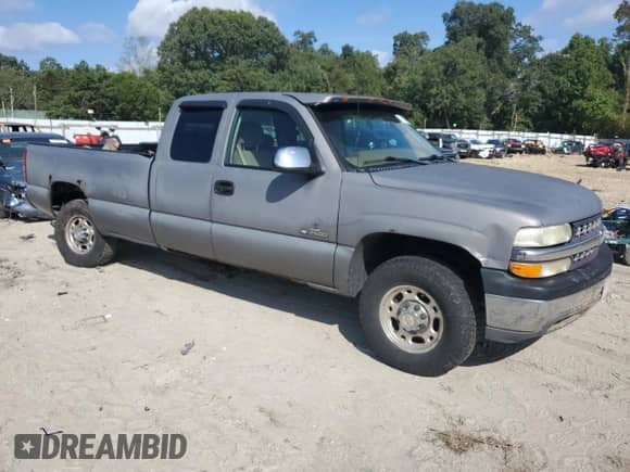 2000 Chevrolet Silverado 2500 LS with VIN 1GCGC29U6YE277564, listed as a Copart auction lot 74107824 with 310,686 mi miles and Salvage title. Bid and sale history available at DreamBid. Image 4.