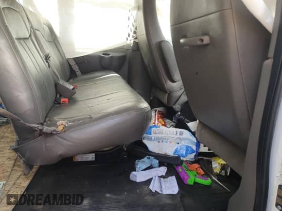 2013 Chevrolet Express Passenger 1LS с VIN 1GAZGZFA6D1120434, выставлен на аукционе Copart как лот 60413545 с пробегом Не указан миль и Списание • Salvage title. История ставок и продаж доступна на DreamBid. Изображение 11.
