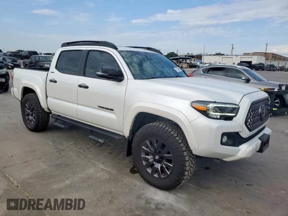2022 Toyota Tacoma Limited with VIN 3TYGZ5AN0NT073325, listed as a Copart auction lot 67148025 with 44,616 mi miles and Salvage title. Bid and sale history available at DreamBid. Image 4.