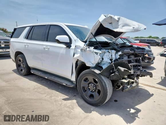 2022 Chevrolet Tahoe Commercial with VIN 1GNSKLED1NR279078, listed as a Copart auction lot 65151445 with Not provided miles and Salvage title. Bid and sale history available at DreamBid. Image 4.