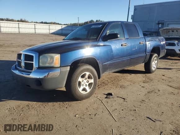 2005 Dodge Dakota SLT with VIN 1D7HW48N65S110206, listed as a Copart auction lot 87088905 with 209,644 mi miles and Salvage title. Bid and sale history available at DreamBid. Image 1.