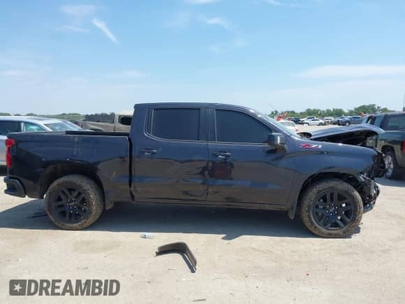 2024 Chevrolet Silverado 1500 RST with VIN 1GCUDEED8RZ166452, listed as a IAAI auction lot 43095521 with 50,889 mi miles and . Bid and sale history available at DreamBid. Image 13.