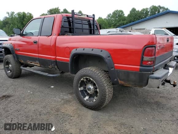 1999 Dodge 2500 with VIN 3B7KF2362XG120312, listed as a Copart auction lot 68067995 with 336,862 mi miles and Clean title. Bid and sale history available at DreamBid. Image 2.