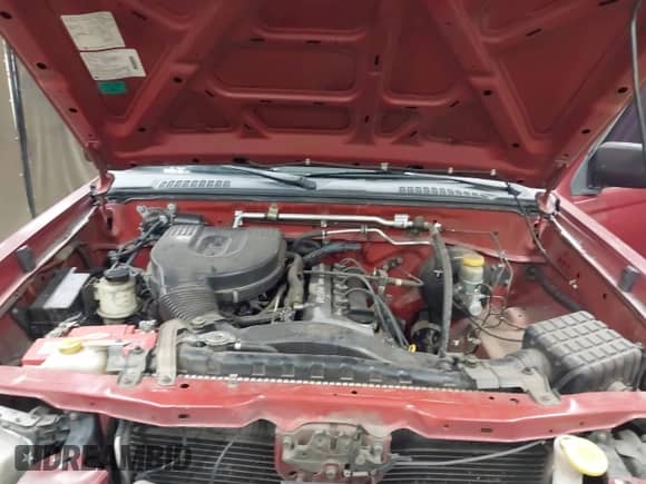 2002 Nissan Frontier XE z VIN 1N6DD26S62C338298, wystawiony jako IAAI lot #43519944 z przebiegiem Nie podano mil oraz . Historia ofert i sprzedaży dostępna na DreamBid. Obrazek 10.