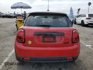 2024 MINI Hardtop Cooper SE with VIN WMW13DJ04R2V85696, listed as a Copart auction lot 56584005 with 4,967 mi miles and Salvage title. Bid and sale history available at DreamBid. Image 6.