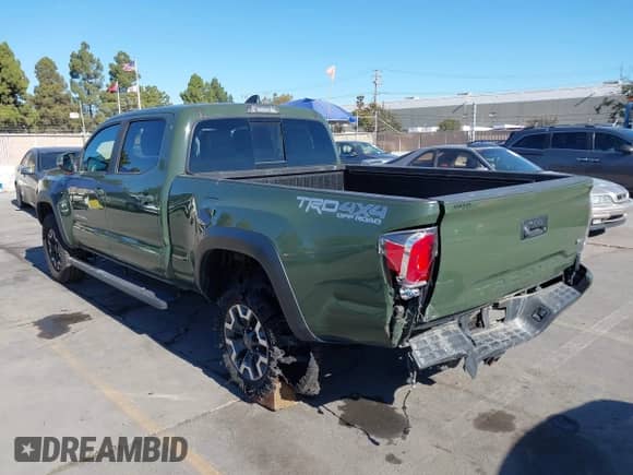 2021 Toyota Tacoma SR5 z VIN 3TMDZ5BN8MM114649, wystawiony jako IAAI lot #43493615 z przebiegiem 63 288 mil mil oraz . Historia ofert i sprzedaży dostępna na DreamBid. Obrazek 6.