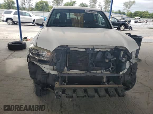 2017 Toyota Tacoma SR5 with VIN 3TMDZ5BNXHM020780, listed as a Copart auction lot 69961745 with 115,824 mi miles and Salvage title. Bid and sale history available at DreamBid. Image 5.