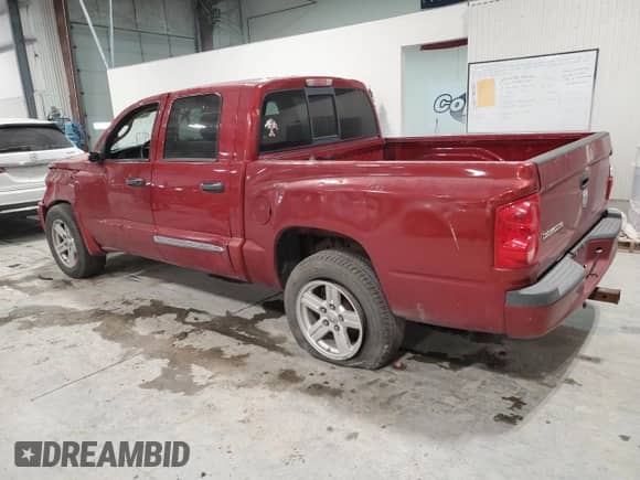 2010 Dodge Dakota Bighorn/Lonestar with VIN 1D7CW3GK0AS135642, listed as a Copart auction lot 85567624 with 94,275 mi miles and Salvage title. Bid and sale history available at DreamBid. Image 2.