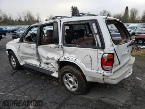 2001 Ford Explorer with VIN 1FMZU85P51ZA00343, listed as a Copart auction lot 85793084 with Not provided miles and Non repairable. Bid and sale history available at DreamBid. Image 2.