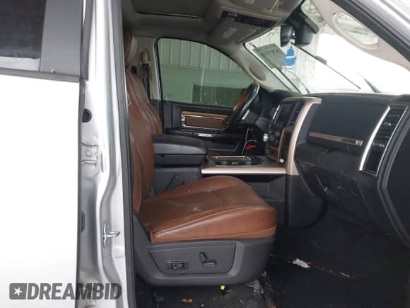 2015 Ram 1500 Laramie Limited with VIN 1C6RR7PT1FS788507, listed as a IAAI auction lot 42400146 with 129,572 mi miles and . Bid and sale history available at DreamBid. Image 5.