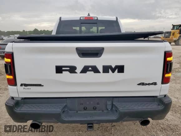 2024 Ram 1500 Rebel z VIN 1C6SRFLT1RN209438, wystawiony jako Copart lot #64185285 z przebiegiem 14 272 mil mil oraz Szkoda całkowita • Salvage title. Historia ofert i sprzedaży dostępna na DreamBid. Obrazek 6.