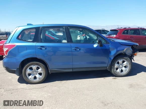 2016 Subaru Forester 2.5i with VIN JF2SJAAC9GG490784, listed as a IAAI auction lot 42845580 with 96,166 mi miles and . Bid and sale history available at DreamBid. Image 14.
