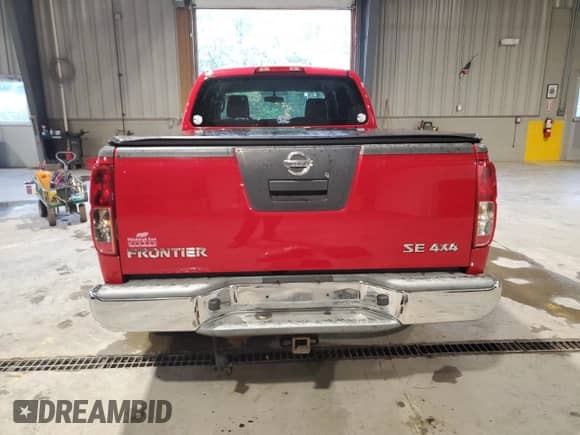 2010 Nissan Frontier SE with VIN 1N6AD0FV6AC406292, listed as a Copart auction lot 84029595 with 94,128 mi miles and Salvage title. Bid and sale history available at DreamBid. Image 6.