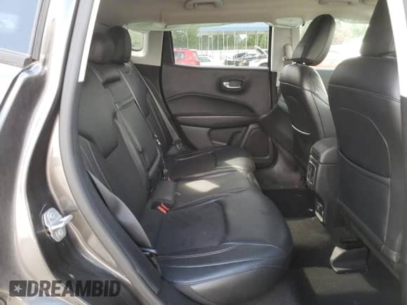 2017 Jeep Compass Latitude z VIN 3C4NJCBB4HT643016, wystawiony jako Copart lot #64889915 z przebiegiem 134 709 mil mil oraz Szkoda całkowita • Salvage title. Historia ofert i sprzedaży dostępna na DreamBid. Obrazek 11.